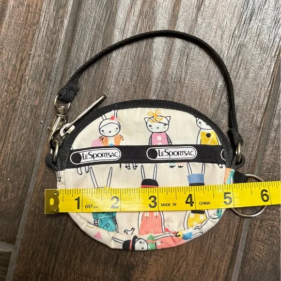 LeSportsac Round Wristlet Pouch in Cream with Multicolor Bunny Picnic Print - Picture 9 of 10
